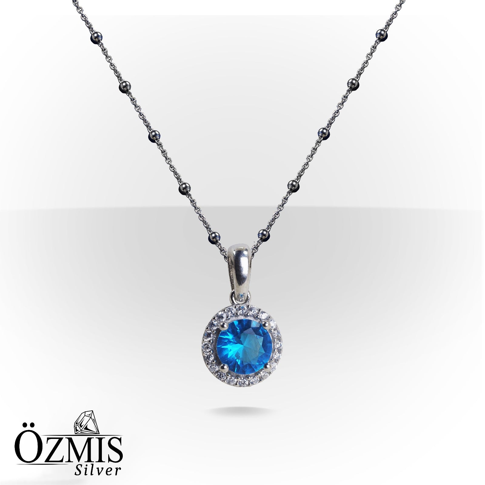 Zirkon Taşlarla Çevrili Aquamarine Taşlı  Gümüş Set